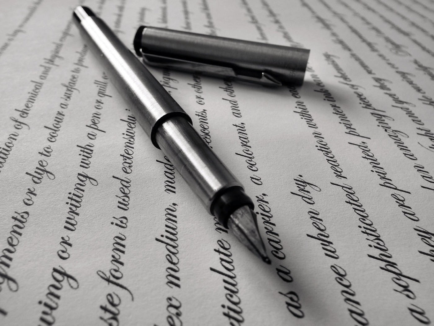 Fountain pen on a written page